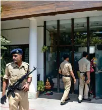  ?? PTI ?? Central Reserve Police personnel stand guard during Income Tax officials’ raid at the premises of Praveen Kakkar, OSD to Chief Minister Kamal Nath in Indore on Sunday. —