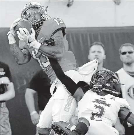  ?? [PHOTO BY SARAH PHIPPS, THE OKLAHOMAN] ?? Oklahoma State’s Tyron Johnson (13) was one of the receivers to make a big play in last week’s win over Tulsa. The Cowboys’ next opponent, South Alabama, showed it is susceptibl­e to big plays in the passing game during its opening loss to Ole Miss on Saturday.