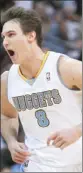  ??  ?? DENVER Nuggets forward Danilo Gallinari celebrates a score past the Toronto Raptors in NBA in Denver
on Friday. — Reuters