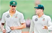  ??  ?? Mitchell Johnson & Michael Clarke