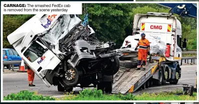  ??  ?? CARNAGE: The smashed FedEx cab is removed from the scene yesterday