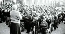  ?? ?? John Berchman Roman Catholic School pupils and teachers at a morning assembly. /Jacob Mawela