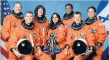  ?? Getty Images ?? > The crew of Space Shuttle Columbia’s mission STS-107 which broke up upon re-entry to earth