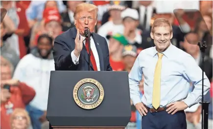  ?? DAVID MAXWELL/EPA-EFE ?? U.S. Rep. Jim Jordan, R-Ohio, at a rally this week with President Donald Trump, was an assistant wrestling coach at Ohio State from 1986 to 1994.