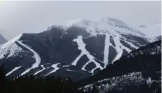  ??  ?? Ski runs are carved out at the Nakiska ski hill, home to the downhill Olympic runs at the 1988 Winter Games hosted by Calgary.