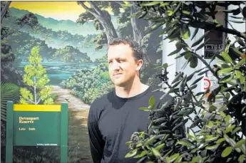  ??  ?? Renowned artist Shane Walker with his mural Tauranga’s Pop-Up Park. in Downtown