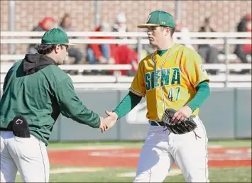  ?? Lexi Woodcock / Siena Athletics ?? Siena left-hander Ben Seiler, right, gets congratula­ted for his effort on Saturday when he struck out 19 against Niagara over nine innings. He had a 16-strikeout effort earlier this season.