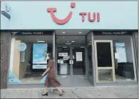  ??  ?? VIRUS- HIT: The Anglo- German travel business Tui said it has cut its fourth quarter programme from 30 per cent to just 25 per cent.