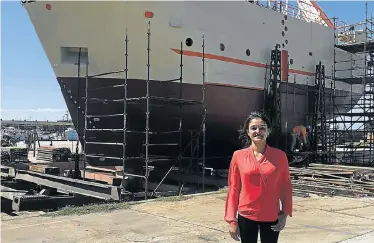  ?? Picture: DENEESHA PILLAY ?? FISHERMAN’S FRIEND: Sharmilla van Heerden with her business’s new stern trawler, Qavak, at the Port of Port Elizabeth