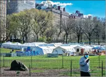  ?? REUTERS ?? New York City has set up an emergency field hospital in Central Park. The city had 60,850 COVID-19 cases as of Saturday.