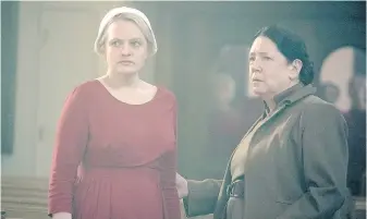  ?? HULU ?? Elisabeth Moss, left, and Ann Dowd in The Handmaid’s Tale, a top contender at the Emmys.