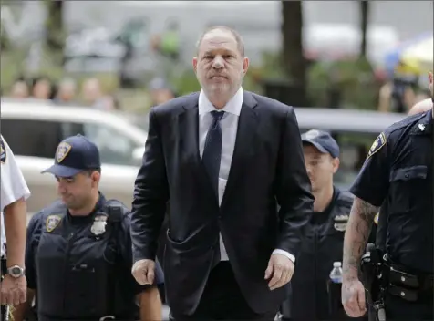  ?? Seth Wenig/Associated Press ?? Harvey Weinstein arrives to court last year in New York. A new book examines several people who allegedly enabled Mr. Weinstein to cover up his actions.