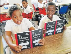  ??  ?? HAPPY PUPILS: Achuma Mpanyana and Chumani Mantyi, both 10, are delighted with their new donated books Marcelle Wentworth, e-mail marcelle.wentworth @gmail.com, tel (041) 585-1083, mobile 060-507-4342