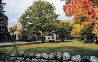  ?? PHOTO BY BOB HOUGHTON, COURTESY OF THE TOWN OF HUDSON ?? Colourful fall foliage frames St. James Church and provides a taste of the picturesqu­e, natural surroundin­gs that give the town of Hudson such appeal.