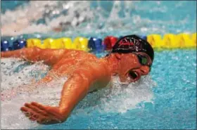  ?? (Austin Hertzog - Digital First Media) ?? Boyertown’s Patrick Lance swims the 100 butterfly during the District 1 Class AAA Swimming Championsh­ips Thursday at La Salle University.