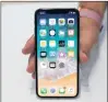  ?? MARCIO JOSE SANCHEZ/THE ASSOCIATED PRESS ?? In this Tuesday file photo, the new iphone X is displayed in the showroom after the new product announceme­nt at the Steve Jobs Theater on the new Apple campus in Cupertino, Calif.