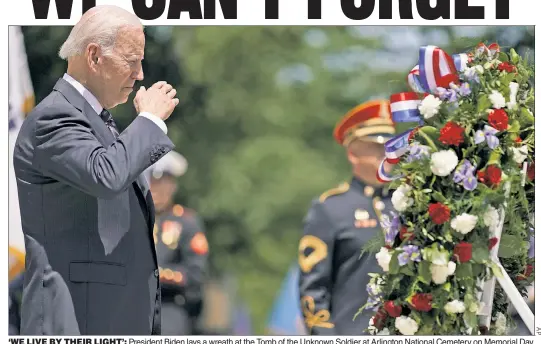  ?? ?? ‘WE LIVE BY THEIR LIGHT’: President Biden lays a wreath at the Tomb of the Unknown Soldier at Arlington National Cemetery on Memorial Day.