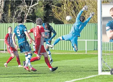  ??  ?? Devante Cole heads home to stretch Motherwell’s lead to 4-0