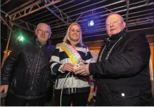  ??  ?? Above: Pat O’Connell and Cllr Ted Lucey watch on as Flower of Macroom Emma Nott turns on the Christmas Lights for Macroom, 2018.