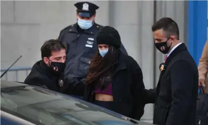  ?? Photograph: Erik Pendzich/REX/Shuttersto­ck ?? Police detectives arrest Miya Ponsetto at the first police precinct in New York City ahead of her arraignmen­t on felony charges for assaulting a 14 year old at a Manhattan hotel.