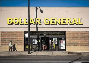  ?? Bloomberg News ?? A Dollar General store is seen in Chicago. The discount retailer’s recent expansion has it moving into some small towns and even buildings vacated by Walmart.