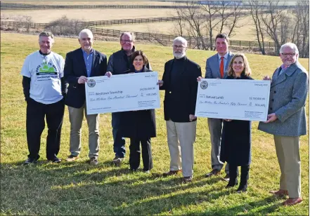  ?? ?? Chester County commission­ers celebrate $6.35million in funding to representa­tives of Westtown and Natural Lands, to support the preservati­on of Crebilly Farm. Pictured left to right are: Westtown Township Supervisor­s Dick Pomerantz and Scott Yaw; Jack Stefferud, Natural Lands Senior Director of Land Protection; Chester County Commission­ers’ Chairwoman Marian Moskowitz; Westtown Supervisor­s’ Chairman Tom Foster; county Commission­ers Josh Maxwell and Michelle Kichline; and Oliver Bass, President of Natural Lands.