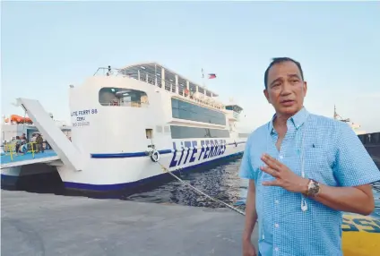  ?? SUNSTAR FOTO / AMPER CAMPAÑA ?? FINISHING TOUCHES. Lite Shipping president Lucio Lim Jr. shows off the Lite Ferry 88 at Pier 3.