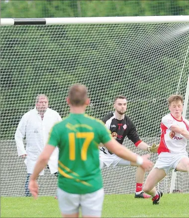  ??  ?? Jack Butterly scores a goal for Naomh Fionnbarra during their IFC quarter-final against St Bride’s on Sunday.