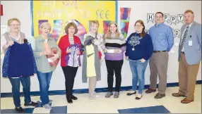  ?? Westside Eagle Observer/MIKE ECKELS ?? Members from Altrusa Internatio­nal were at Northside Elementary April 20 to present a check, coats and water bottles to faculty and administra­tors of the Decatur school. Present for this event were Connie Brown (left), Gay Kiker, Karen Robbins, Gail Cowdin, Karen McCauley, Allyson Carter, Cary Stamps and Steve Watkins.