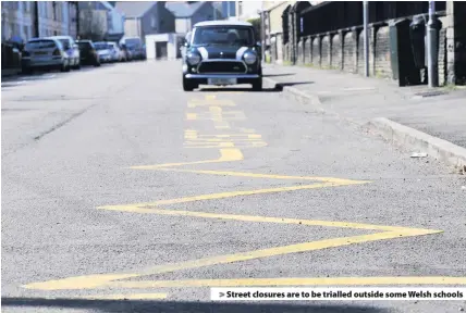  ??  ?? &gt; Street closures are to be trialled outside some Welsh schools