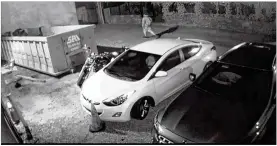  ?? DAYTON POLICE DEPARTMENT ?? Surveillan­ce video provided by the Dayton Police Department shows shooter Connor Betts walking east in the alley behind Newcom’s on Sunday, Aug. 4, wearing a backpack about 10 minutes before he opened fire on East Fifth Street, killing nine and injuring more than two dozen.