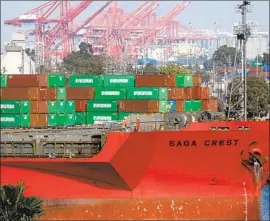  ?? Luis Sinco Los Angeles Times ?? WITH CHINESE factories operating at about 40% of capacity, the ports of L.A. and Long Beach project a 15% to 17% plunge in cargo volumes in the first quarter.