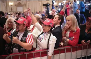  ?? Photo by WIN MCNAMEE / GETTY IMAGES NORTH AMERICA / Getty Images via AFP ?? Guests watch results and await the arrival of Republican presidenti­al candidate, former President Donald Trump, at an election-night watch party at Mar-a-Lago on March 05, 2024 in Palm Beach, Florida.