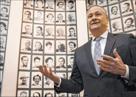  ?? Michal Dyjuk
The Associated Press ?? Second gentleman Doug Emhoff speaks to the media Saturday at the Oskar Schindler Enamel Factory Museum in Krakow, Poland.