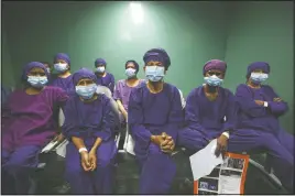  ?? (AP/Niranjan Shrestha) ?? Nepalese patients wait to receive anesthesia before eye surgery at the Tilganga Eye Center in Kathmandu, Nepal.