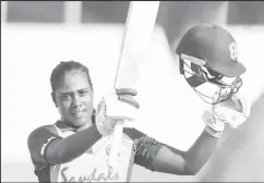  ??  ?? Opener Hayley Matthews celebrates her maiden internatio­nal internatio­nal hundred at her home ground Kensington Oval. (Photo courtesy CWI Media)