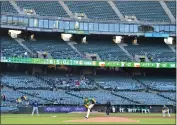  ?? JOSE CARLOS FAJARDO — BAY AREA NEWS GROUP ?? The Athletics' Daulton Jefferies pitches against the Tampa Bay Rays and in front of few fans at the Coliseum in Oakland on Monday.