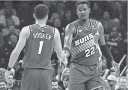  ?? ROB SCHUMACHER/THE REPUBLIC ?? Suns guard Devin Booker and center Deandre Ayton teamed for 81 points against the Bulls on Wednesday night at Footprint Center.