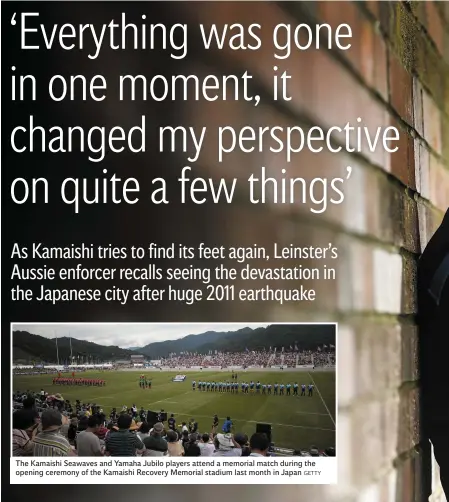  ??  ?? The Kamaishi Seawaves and Yamaha Jubilo players attend a memorial match during the opening ceremony of the Kamaishi Recovery Memorial stadium last month in Japan