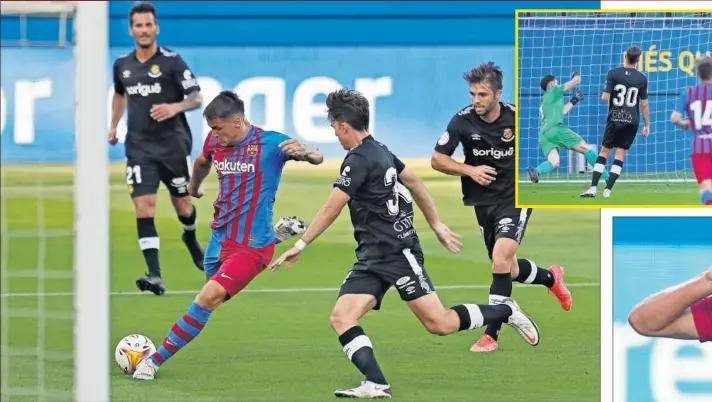  ??  ?? Rey Manaj, ante la presión de Iván de la Peña y la mirada de Fran Carbia, hace el 1-0 del Barcelona ante el Nàstic de Tarragona en el Estadio Johan Cruyff.