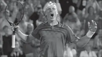  ?? CANADIAN PRESS FILE PHOTO ?? Denis Shapovalov celebrates after beating Adrian Mannarino of France in quarter-final play at the Rogers Cup on Aug. 11.