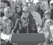  ?? BARBARA PERENIC/COLUMBUS DISPATCH ?? South Dakota Gov. Kristi Noem makes an appearance Saturday with former President Donald Trump outside Wright Bros. Aero Inc. at the Dayton Internatio­nal Airport in Ohio, while also stumping for U.S. Senate candidate Bernie Moreno.