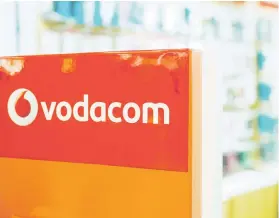  ?? Bloomberg Picture: ?? IN THE RED Vodacom clients may be delighted with the new bundle offerings available, but they might blanche at a 47% hike in costs.