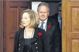  ?? CP FILE PHOTO ?? Bank of Canada Governor Stephen Poloz and Senior Deputy Governor Carolyn Wilkins arrive at the House of Commons for a Standing Committee on Finance meeting in October.