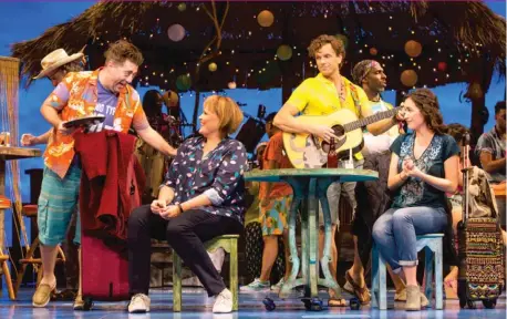  ??  ?? ABOVE: Eric Petersen ( from left), Lisa Howard, Paul Alexander Nolan and Alison Luff in “Escape to Margaritav­ille,” the Jimmy Buffett musical.