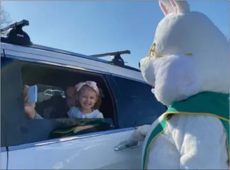  ?? SUBMitteD Photo ?? children had the opportunit­y to get their photo taken with the easter Bunny at the Daniel Boone optimist club easter Bunny Drive-thru at amity community Park.