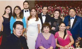  ??  ?? (Seated) Eddie, Annabelle and Ruffa Gutierrez; (standing, from left) Alexa Gutierrez, Micheline Rama, Elvis Gutierrez, Belinda Wong and former Cebu City mayor Michael Rama with Carla and Joel del Prado.