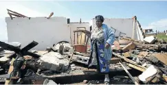  ??  ?? eMpolweni resident Thunyeliwe Ndlovu, 63, lost her son when the tornado struck the rural settlement in KwaZulu-Natal late on Tuesday.