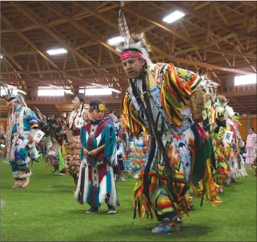 ?? Herald photo by J.W. Schnarr ?? Dancers and drummers filled the air with the colours and sounds of the Blackfoot people on Saturday at the 60th Annual Piikani Nation Celebratio­ns Powwow in Brocket.