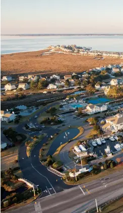  ??  ?? Pirate’s Cove (right) is a popular destinatio­n and home to the Pirate’s Cove Billfish Tournament. Charter captain turned boatbuilde­r Paul Spencer (below) reflects on a lifetime spent pursuing billfish off the Carolina coast.